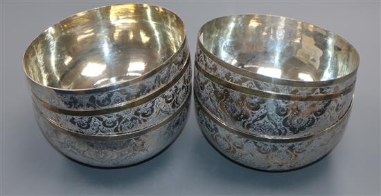 A set of six Persian engraved white metal finger bowls, 998 grams.